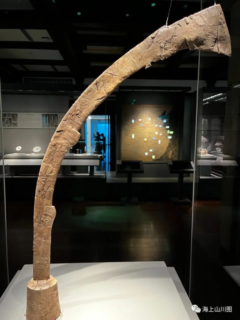 An ivory scepter with human and beast face patterns, unearthed from the Guangfulin site. Shanghai History Museum